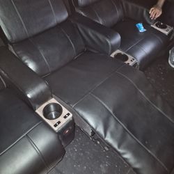 Sticking out in the aisle ways in a dark theater