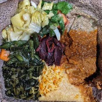 Delish Ethiopian Cuisine - Veggie Combo: Miser, Shiro, Ater, Fasolia, Gomen, Cabbage, Key siir, Azefa, Sufe fitfit, Tomato Salad - Ethiopian Near Me - Seattle, Washington Delish Ethiopian Cuisine - Veggie Combo: Miser, Shiro, Ater, Fasolia, Gomen, Cabbage, Key siir, Azefa, Sufe fitfit, Tomato Salad - Ethiopian Near Me - Seattle, Washington