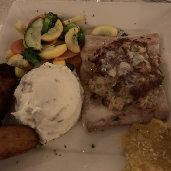 Key Largo Conch House - Mahi mahi with mango crabcake - Seafood Near Me - Key Largo, Florida Key Largo Conch House - Mahi mahi with mango crabcake - Seafood Near Me - Key Largo, Florida
