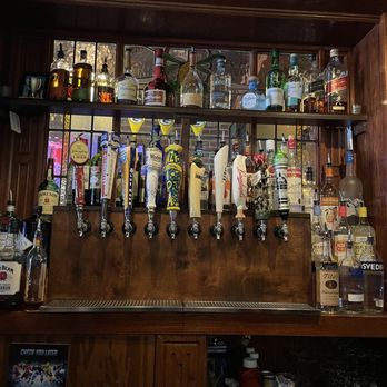 Hamilton's Bar & Grill - a row of beer taps - Sports Bars Near Me - Washington, DC, District of Columbia