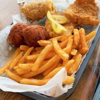 The Oar House - Fish & chips with hushpuppies. - American Near Me - Pensacola, Florida The Oar House - Fish & chips with hushpuppies. - American Near Me - Pensacola, Florida