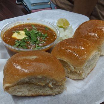 Rajula's Kitchen - two rolls of bread and a bowl of soup - Vegetarian Near Me - Little Elm, Texas