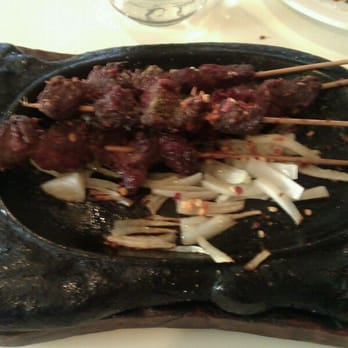 Lao Sze Chuan - lamb satay on a lamb-shaped hot plate - Szechuan Near Me - Chicago, Illinois Lao Sze Chuan - lamb satay on a lamb-shaped hot plate - Szechuan Near Me - Chicago, Illinois