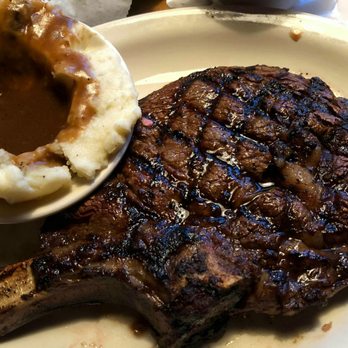 Texas Roadhouse - Bone in Ribeye with side mashed potatoes - Barbeque Near Me - Rosenberg, Texas Texas Roadhouse - Bone in Ribeye with side mashed potatoes - Barbeque Near Me - Rosenberg, Texas