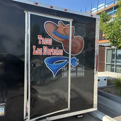 Tacos Los Norteños - Side view of truck exterior.