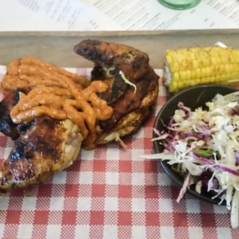 Rocksia Hotel - Half Portuguese chicken with peri peri sauce - Bars Near Me - Arncliffe, NSW