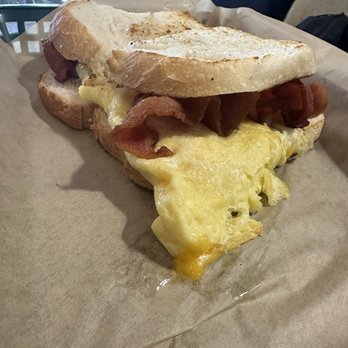 Tree House Café - Breakfast sandwich on sourdough, egg, bacon, cheddar cheese - Coffee & Tea Near Me - Kings Beach, California Tree House Café - Breakfast sandwich on sourdough, egg, bacon, cheddar cheese - Coffee & Tea Near Me - Kings Beach, California
