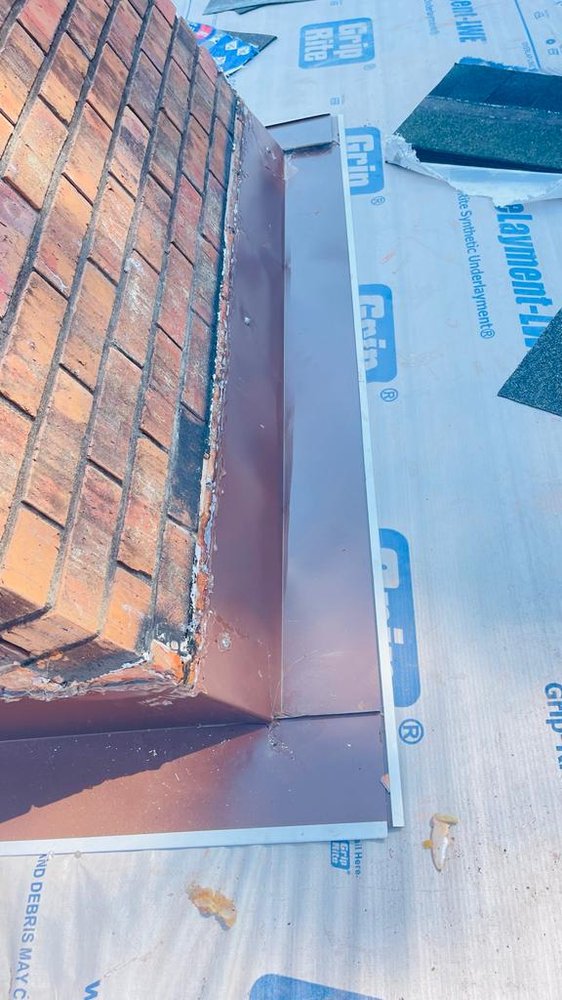 Slide of Santos Roofing