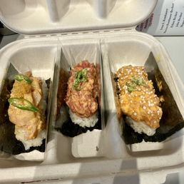 Spicy yellowtail hand roll, spicy tuna hand roll, spicy salmon hand roll Spicy yellowtail hand roll, spicy tuna hand roll, spicy salmon hand roll