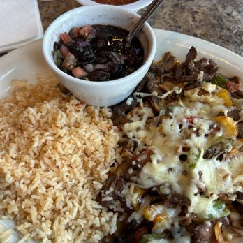 Chiquitos Cantina and Grill - Alambre with grilled steak, black beans and rice. - Mexican Near Me - Conyers, Georgia Chiquitos Cantina and Grill - Alambre with grilled steak, black beans and rice. - Mexican Near Me - Conyers, Georgia