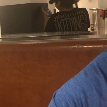 Chipotle Mexican Grill - Employee on their phone - Mexican Near Me - Mclean, Virginia