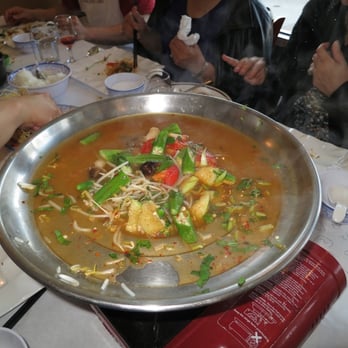 Hoanh Long Vietnamese & Chinese Restaurant - # 100 - Catfish spicy hot pot - step 3 - Vietnamese Near Me - Chicago, Illinois