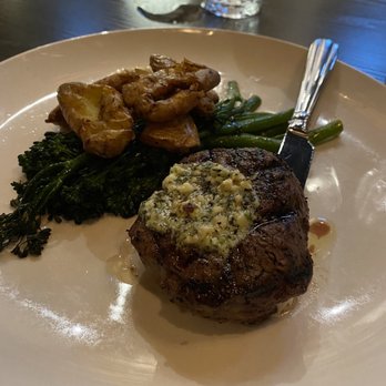 Bella - Gorgonzola filet with crispy potatoes, aioli, and broccolini. Cooked rare and juicy. - Italian Near Me - Maryville, Tennessee