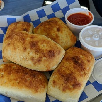 Slice and Dice Pizzeria - Huge bread sticks served with marinara sauce .. a meal in itself!! - Pizza Near Me - Albuquerque, New Mexico Slice and Dice Pizzeria - Huge bread sticks served with marinara sauce .. a meal in itself!! - Pizza Near Me - Albuquerque, New Mexico