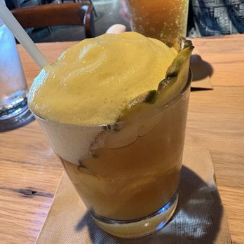 Moku Kitchen - Monkeypod Mai Tai with honey. -lilikoi foam - Cocktail Bars Near Me - Honolulu, Hawaii Moku Kitchen - Monkeypod Mai Tai with honey. -lilikoi foam - Cocktail Bars Near Me - Honolulu, Hawaii