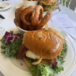 Hot honey fried chicken sandwich and Smokehouse Burger with onion rings and fries