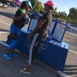 Distinctive Home & Health Care - Office Manager Jasmine explaining our services to a participant before Start Time