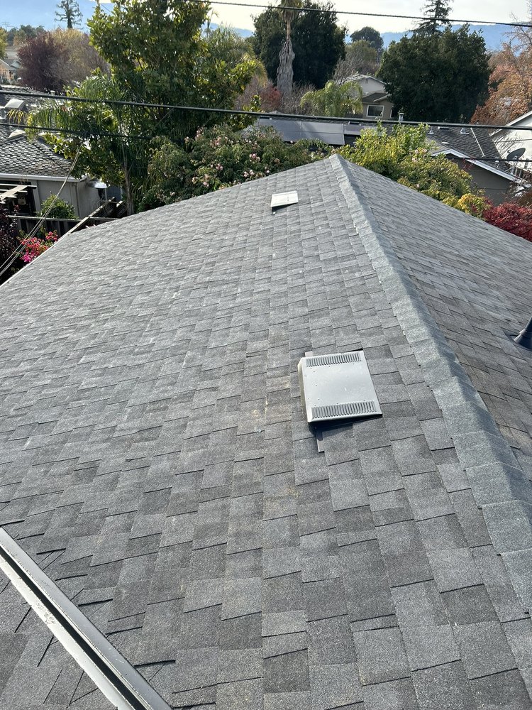Slide of Tip Top Roofing