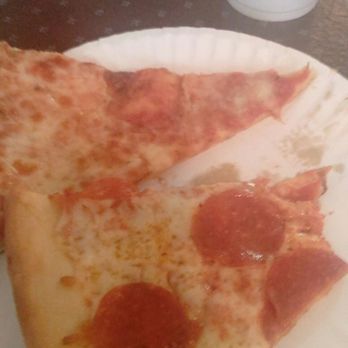 Mark Twain's Pizza Landing - Slice of cheese, slice of pepperoni. - Pizza Near Me - Metairie, Louisiana Mark Twain's Pizza Landing - Slice of cheese, slice of pepperoni. - Pizza Near Me - Metairie, Louisiana