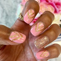 Image Salon and Spa - Mai does an awesome job with fun nail designs! Linen Pink w/ gold glitter chevron pattern.
