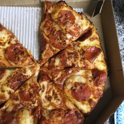 Domino's Pizza - Super saucy, I shouldn't be able to see it. More cheese please!