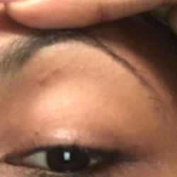 Eyes by India - When she was doing that side it hurt extremely bad and i now know why. i have two cuts there on me !