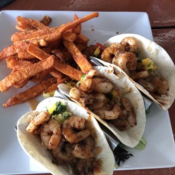 Riptides Raw Bar & Grill - Shrimp tacos with sweet potato fries - Seafood Near Me - Ormond Beach, Florida Riptides Raw Bar & Grill - Shrimp tacos with sweet potato fries - Seafood Near Me - Ormond Beach, Florida