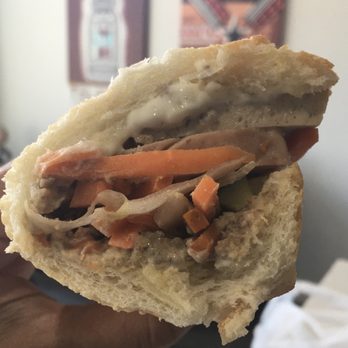 MyMy Sub - a person holding a sandwich - Vietnamese Near Me - Calgary, Alberta MyMy Sub - a person holding a sandwich - Vietnamese Near Me - Calgary, Alberta