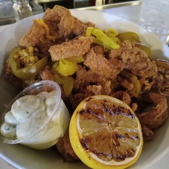 Taverna Modern Mediterranean - Calamari came with jalapeno slices for some reason. - Greek Near Me - Flagstaff, Arizona Taverna Modern Mediterranean - Calamari came with jalapeno slices for some reason. - Greek Near Me - Flagstaff, Arizona