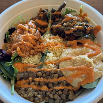 ZOA Moroccan Kitchen - Greenway - Lentils, couscous, salad as a base, hummus, cinnamon carrots and eggplant with harissa sauce on top - Moroccan Near Me - Houston, Texas ZOA Moroccan Kitchen - Greenway - Lentils, couscous, salad as a base, hummus, cinnamon carrots and eggplant with harissa sauce on top - Moroccan Near Me - Houston, Texas