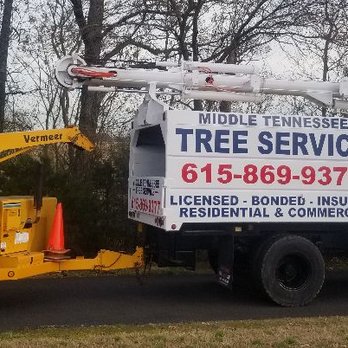 Middle Tennessee Tree Service - Bucket truck and chipper will all the safety gear to provide excellent service. - Tree Services Near Me - Murfreesboro, Tennessee Middle Tennessee Tree Service - Bucket truck and chipper will all the safety gear to provide excellent service. - Tree Services Near Me - Murfreesboro, Tennessee