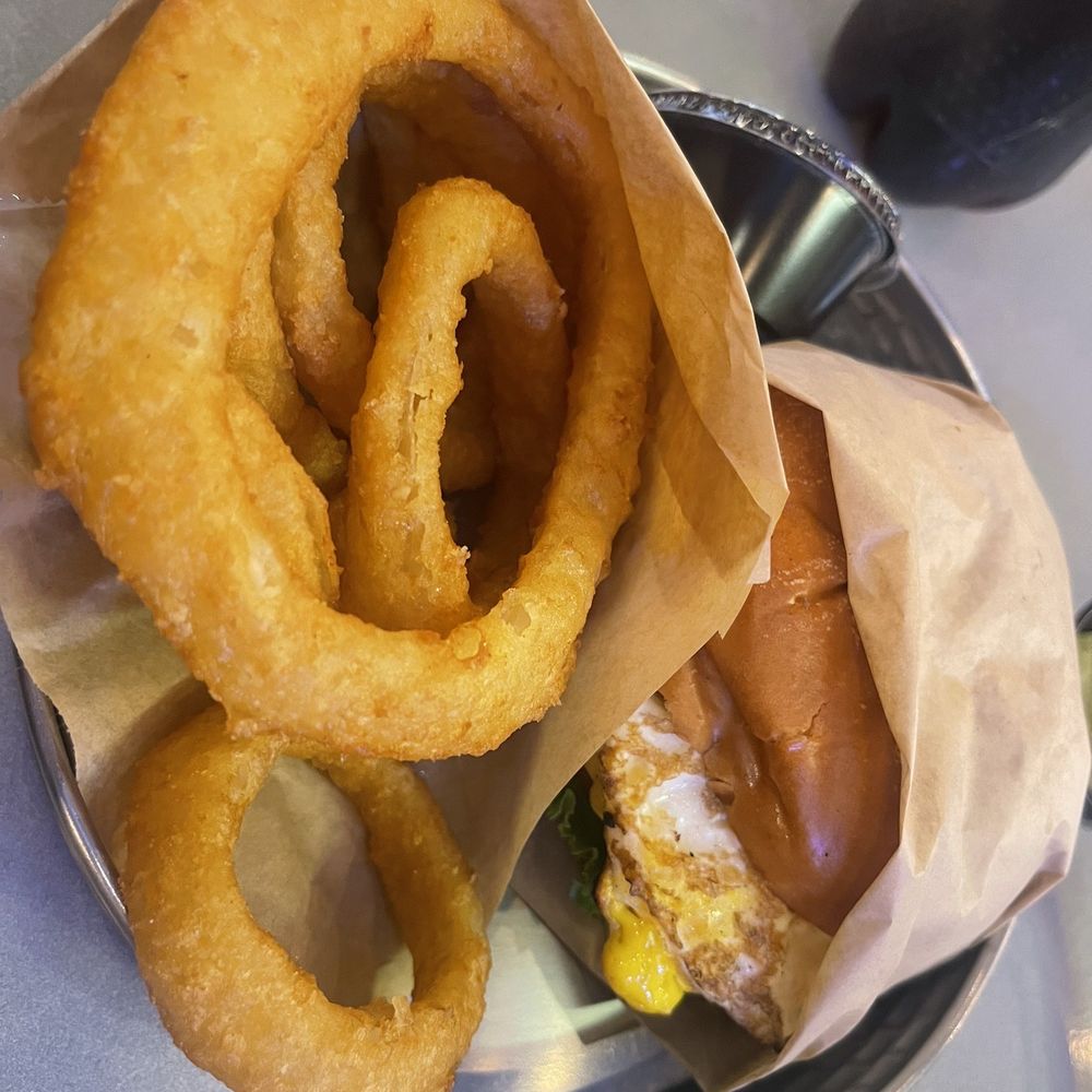 A+ Burger - Cheeseburger with added fried egg and side of onion rings - Burgers Near Me - Oakland, California A+ Burger - Cheeseburger with added fried egg and side of onion rings - Burgers Near Me - Oakland, California