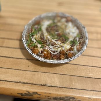 Mountain Food Restaurant And Bar - Samosa chaat in take out packaging! - Indian Near Me - Shelburne, Vermont Mountain Food Restaurant And Bar - Samosa chaat in take out packaging! - Indian Near Me - Shelburne, Vermont
