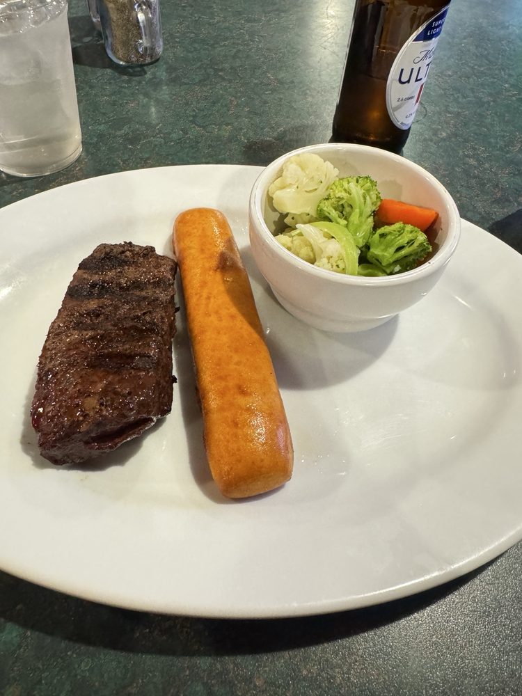 Bullwacker's Saloon & Steakhouse Logo