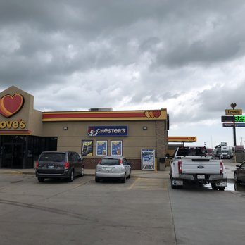 Love's Travel Stop - Another view of the storefront and the big gasoline sign. - Gas Stations Near Me - Okemah, Oklahoma Love's Travel Stop - Another view of the storefront and the big gasoline sign. - Gas Stations Near Me - Okemah, Oklahoma