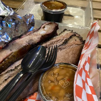 Spats - a tray of ribs, beans, and sauce - Dive Bars Near Me - Berkeley, California