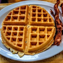 Ruth's Kitchen - Waffle with Pecans and a side of crispy bacon.
