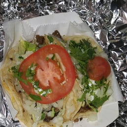 "Steak tacos"- cilantro, onions, lettuce, tomatoes, & sour cream "Steak tacos"- cilantro, onions, lettuce, tomatoes, & sour cream