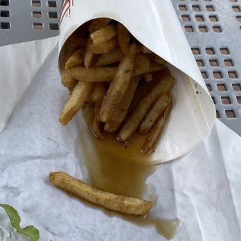 Smashburger - My stomach got upset just looking at the oil spill out - Burgers Near Me - Orlando, Florida