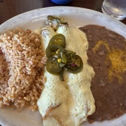 Lunch menu #1 Two Enchiladas (chicken with jalapeños and sour cream sauce) with rice and beans. Lunch menu #1 Two Enchiladas (chicken with jalapeños and sour cream sauce) with rice and beans.