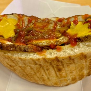 Blu Dogz - Single Hot Dog with Sautéed Onions. thinly sliced onions, bell peppers, ketchup and mustard, in a pita bread. - Hot Dogs Near Me - Honolulu, Hawaii Blu Dogz - Single Hot Dog with Sautéed Onions. thinly sliced onions, bell peppers, ketchup and mustard, in a pita bread. - Hot Dogs Near Me - Honolulu, Hawaii