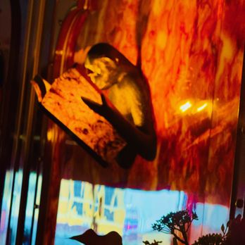 Caramella Italian Restaurant & Lounge - Monkeys reading books light fixtures - Italian Near Me - Las Vegas, Nevada Caramella Italian Restaurant & Lounge - Monkeys reading books light fixtures - Italian Near Me - Las Vegas, Nevada