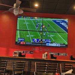 The Wing Boss - Large screen TV with sports on