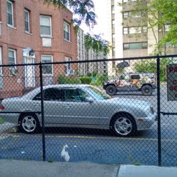 Traffic Violations Bureau - Queens North - TVB + NYC = BAG OF DOG SHIT TIED TO A CHURCH FENCE