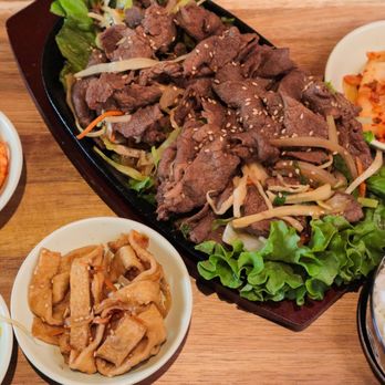 J's Korean Food - Beef Bulgogi with homemade Korean side dishes. Traditional kimchi, shredded radish kimchi, bean sprouts, and fish cake. - Korean Near Me - Sarasota, Florida