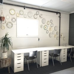 A La Crate Vintage Rentals - Our new office spaces hiding behind the crate wall!