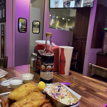 Duke's Beach Grill - Halibut-n-chips Sweet potato fries, coleslaw, malt vinegar, coke, Beach Bums TV. - Bars Near Me - Ventura, California Duke's Beach Grill - Halibut-n-chips Sweet potato fries, coleslaw, malt vinegar, coke, Beach Bums TV. - Bars Near Me - Ventura, California