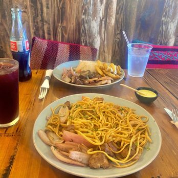 Picante - Can't eat Peruvian without my chicha morada drink. Tallarín salteado de pollo y lomo saltado - Peruvian Near Me - Ontario, California