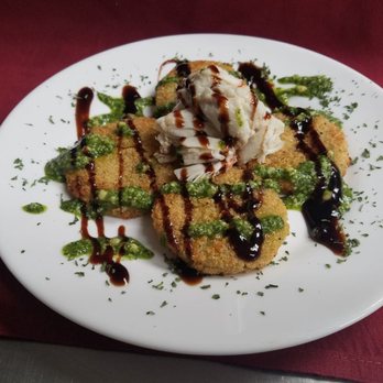 Jungle Bar - Fried Green Tomatoes with jumbo lump crab, pesto & balsamic glaze - American Near Me - Ocean City, Maryland Jungle Bar - Fried Green Tomatoes with jumbo lump crab, pesto & balsamic glaze - American Near Me - Ocean City, Maryland