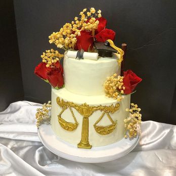 17th Street Bakery - Future lawyer Cake-Vanilla cake with Bailey's chocolate mousse filling, mascarpone buttercream.Accents all made with chocolate.Fresh flowers - Custom Cakes Near Me - Naples, Florida